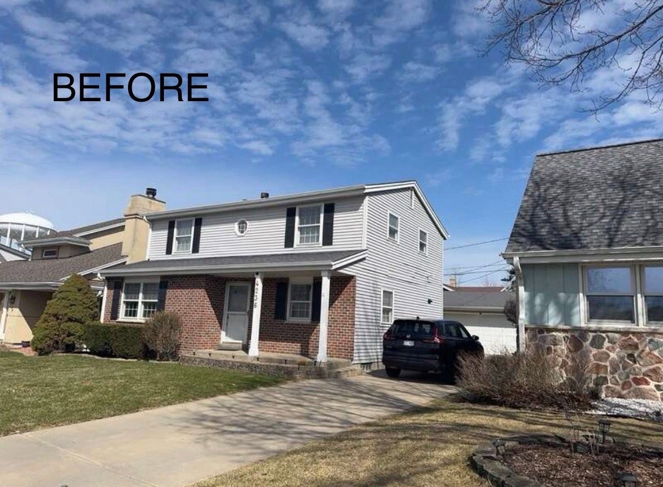 Home with old tan siding before TrueNorth Exteriors